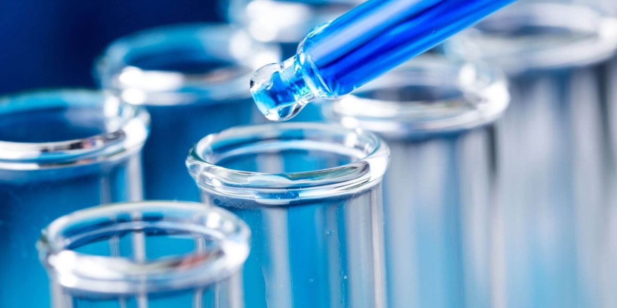 Liquid being placed into a test tube for drug testing