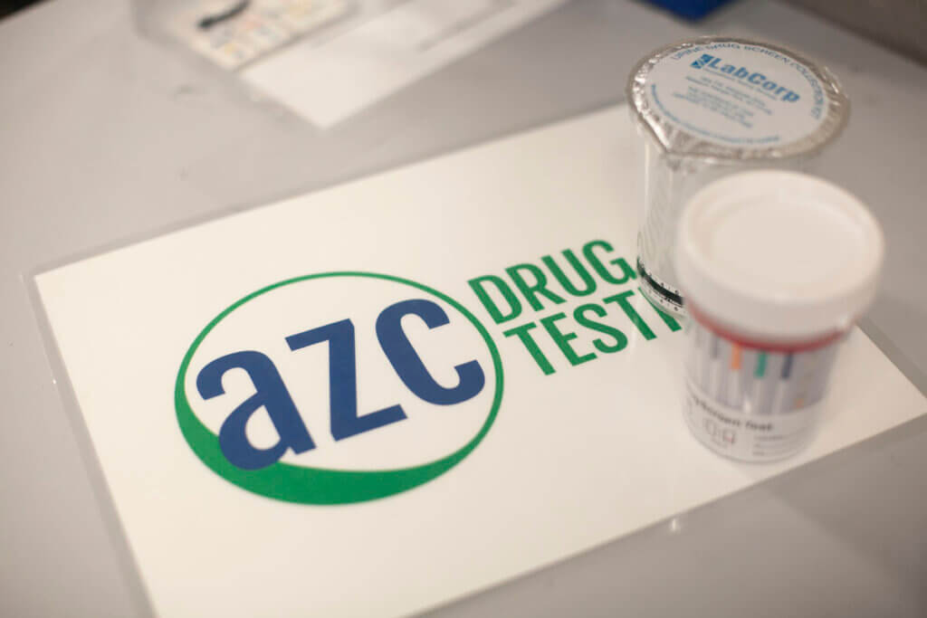 AZC Drug Testing form with 2 collection cups