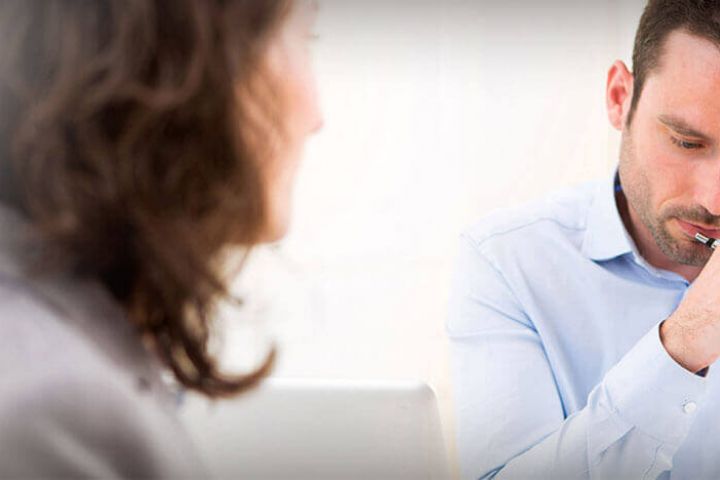 2 business professionals reviewing paperwork