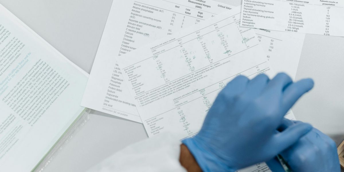 Medical Review Officer (MRO) Explained: How DOT Drug Test Results Get Verified Medical professional reviewing DOT drug test laboratory results during MRO verification