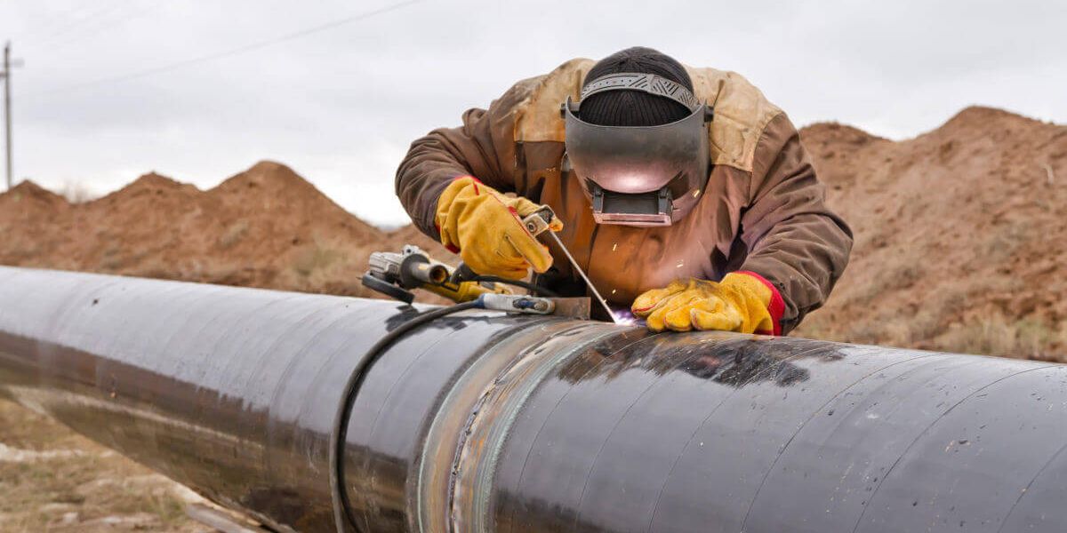 How PHMSA Drug Testing Guidelines Are Changing in 2018 Welder working on an outdoor pipeline